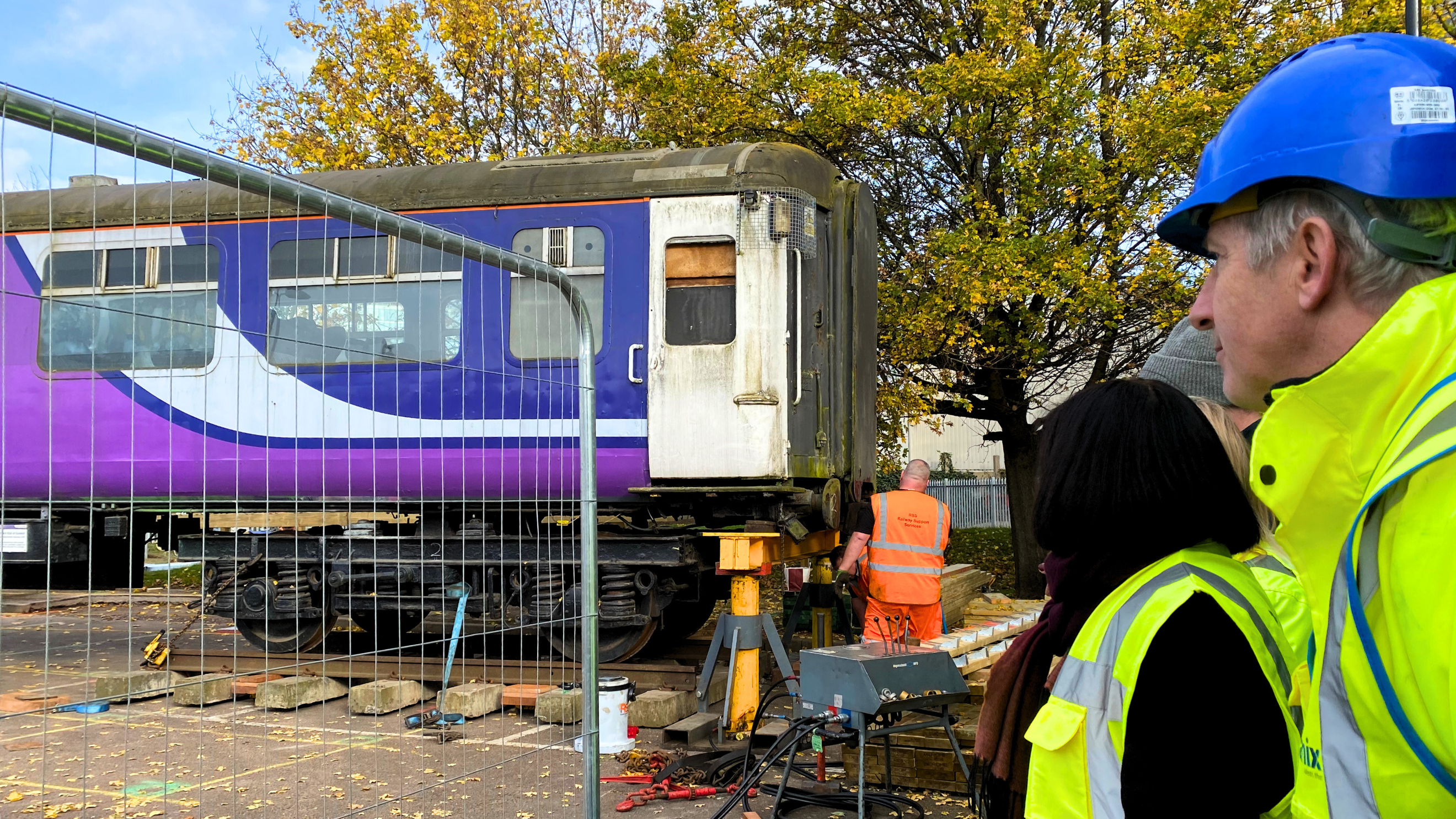 Newham Mayor Rokhsana Fiaz oversees the delivery of the train carriage.